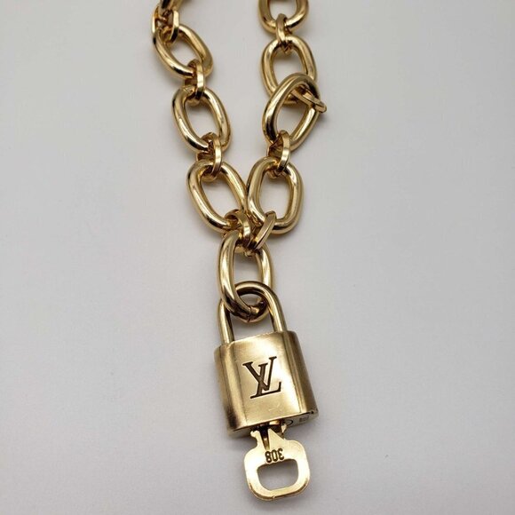 Authentic Louis Vuitton Lock and Key Gold Color with Gold Plated Chain Necklace - Picture 5 of 14